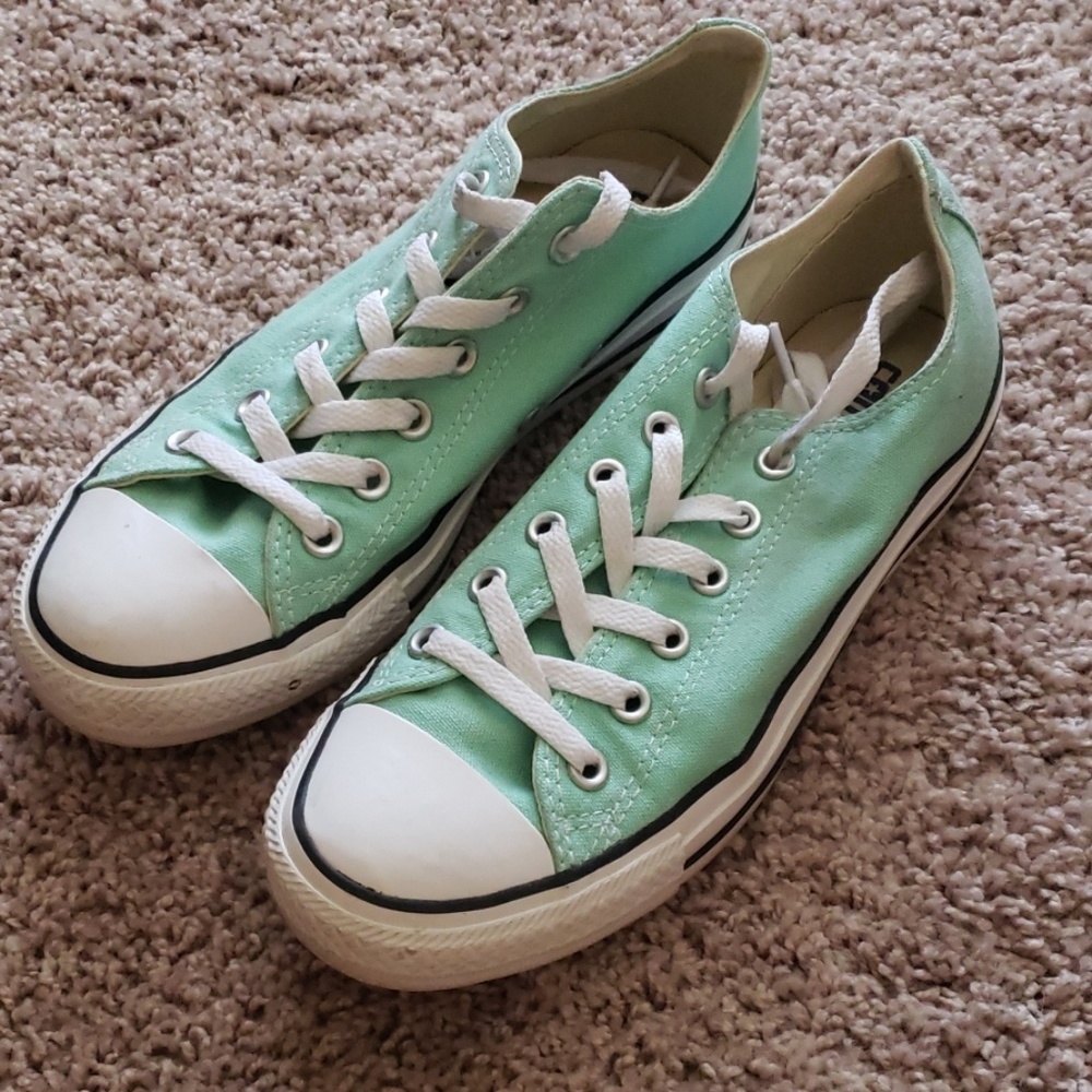 Mint green Converse tennis shoes